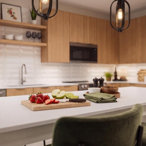 a kitchen with a table and chairs