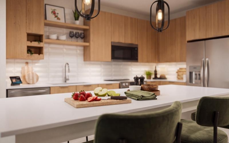 a kitchen with a table and chairs